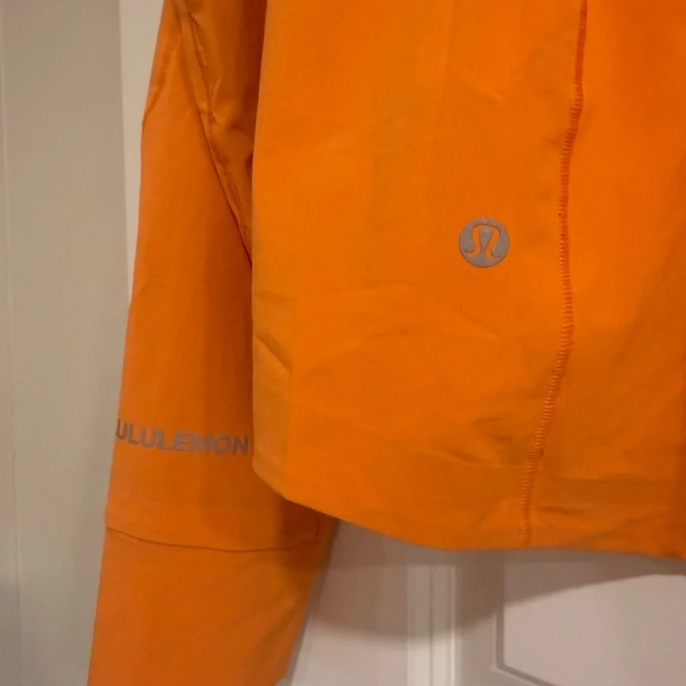Lululemon Athletica Vibrant Orange Mist Over Windbreaker Jacket